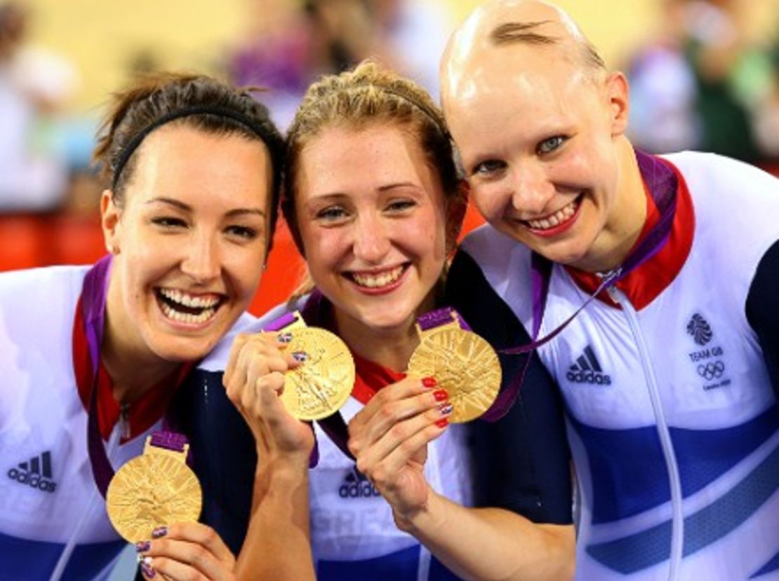 Rowsell, Dani King (left) Laura Trott (center) show off their Olympic gold medals.