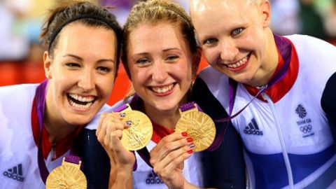 Rowsell, Dani King (left) Laura Trott (center) show off their Olympic gold medals.