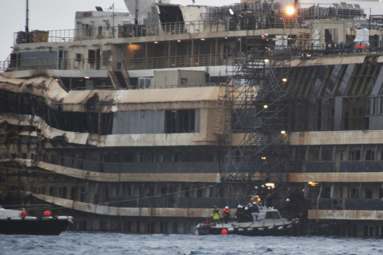 Experts inspect the ship's damage in January. They boarded the vessel to collect new evidence, focusing on the ship's bridge and the onboard elevators.