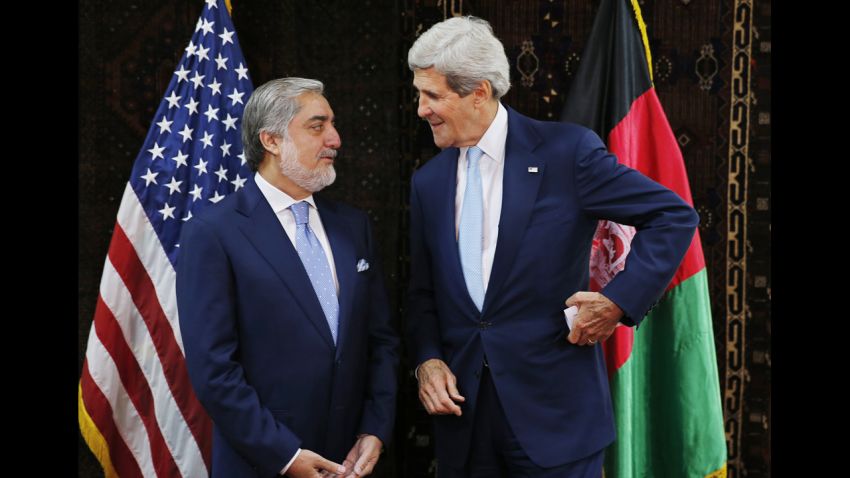U.S. Secretary of State John Kerry talks with Afghan presidential candidate Abdullah Abdullah, left, at the start of a meeting at the U.S. Embassy in Kabul, July 11, 2014. Kerry sought Friday to broker a deal between Afghanistan's rival presidential candidates as a bitter dispute over last month's runoff election risked spiraling out of control.(AP Photo/Jim Bourg, Pool)