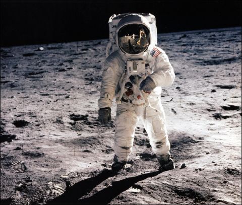 Astronaut Edwin "Buzz" Aldrin walks on the lunar surface during the Apollo 11 mission.