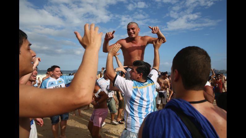 Argentina fans gather on Copacabana Beach ahead of the match in Rio de Janeiro, Brazil.  