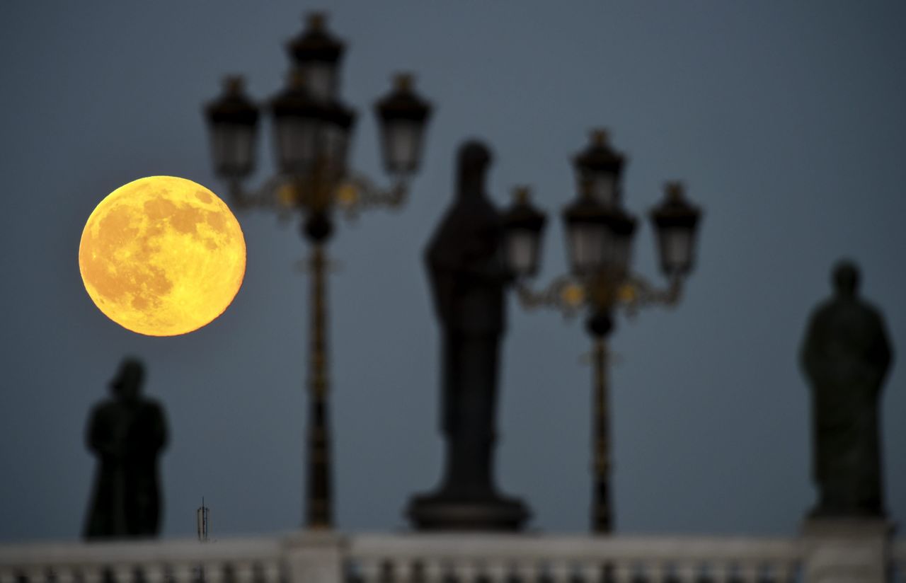A "supermoon" is seen over a bridge in the center of Skopje, Macedononia, on Saturday, June 12.  The phenomenon occurs when the moon becomes full on the same day as its perigee -- the point in the moon's orbit when it's closet to Earth.
