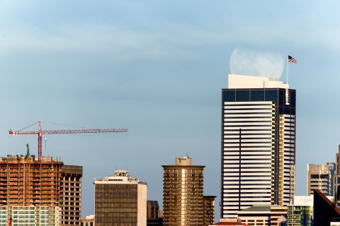 <a href="http://ireport.cnn.com/docs/DOC-1152205">Durkan </a>waited outside all night to photograph the supermoon, trying to capture an evening and day shot of the bright moon.