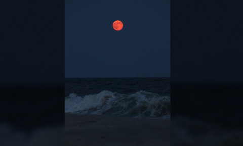 As the supermoon rose over the Long Island coast, <a href="http://ireport.cnn.com/docs/DOC-1152204">Elias Aliprandis </a>said he was inspired to take a photo because of its amazing beauty and bright orange hue. 