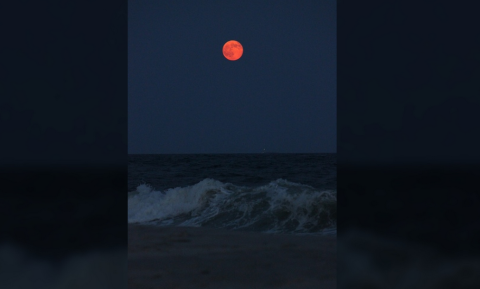 As the supermoon rose over the Long Island coast, <a href="http://ireport.cnn.com/docs/DOC-1152204">Elias Aliprandis </a>said he was inspired to take a photo because of its amazing beauty and bright orange hue.