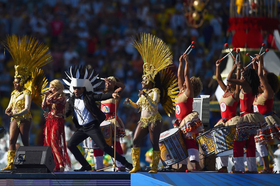 Pop star Shakira, second from left, performs in the closing ceremony prior to the match.