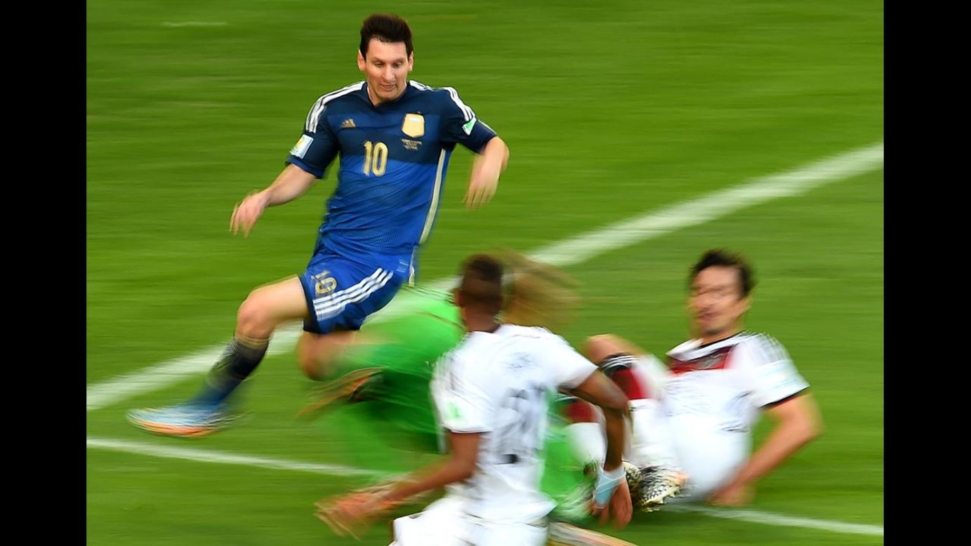 In this photo, shot using a slow shutter speed, Messi makes a run into Germany's penalty box.