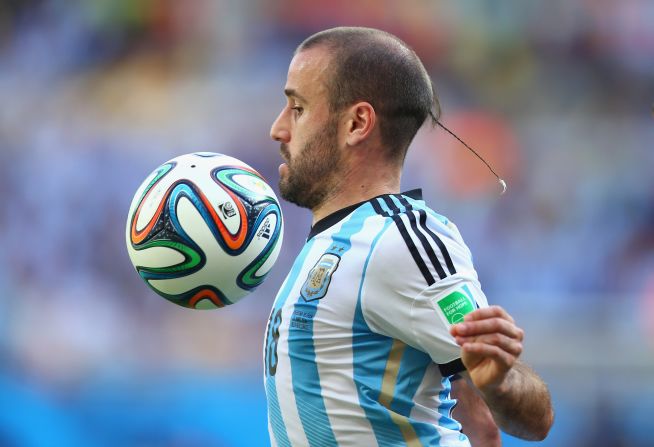 Argentina's Rodrigo Palacio sports a rat tail in the group stage of the 2014 tournament.