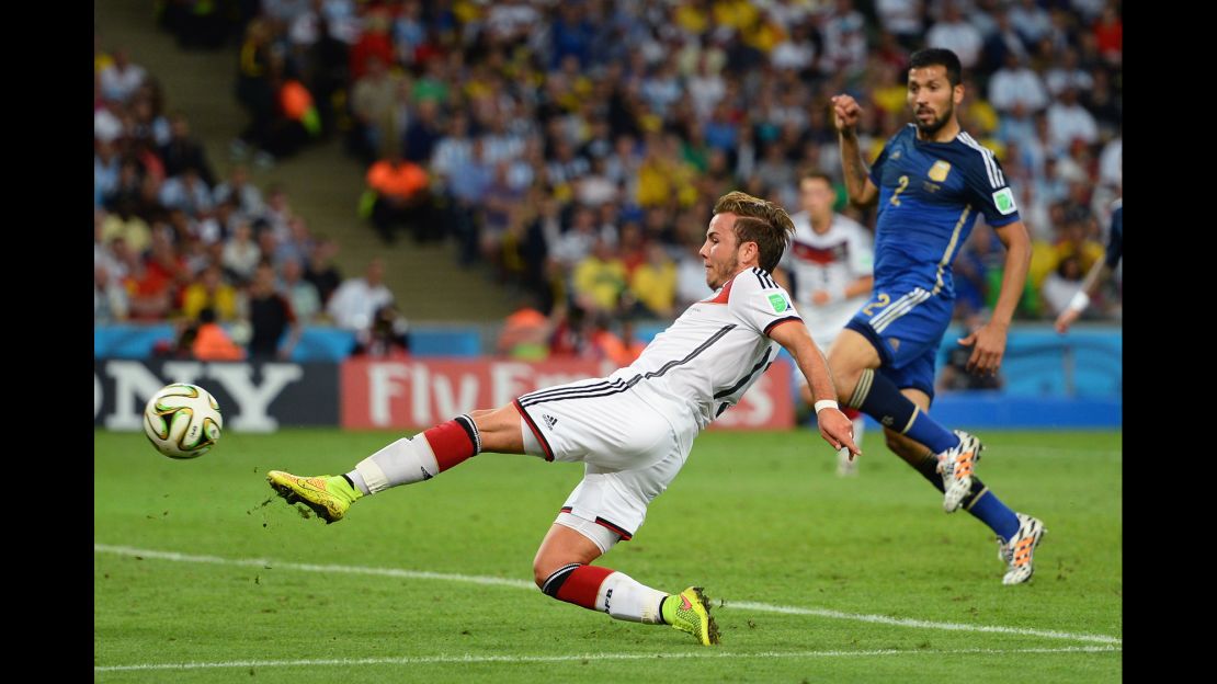 Mario Götze of Germany scores the only goal of the game during extra time during the World Cup final against Argentina at Maracana. 