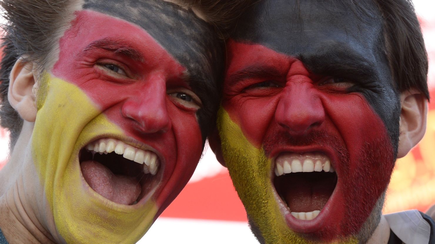 German fans pose ahead of the game at the Olympic stadium in Munich.
