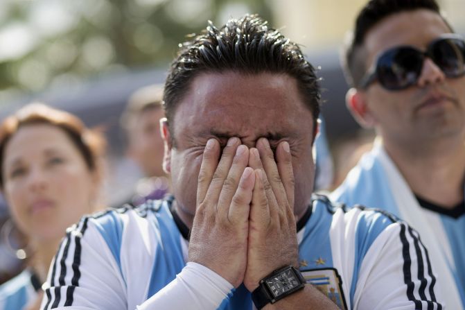 An Argentina fan in Miami Beach, Florida, reacts after his team lost the final.