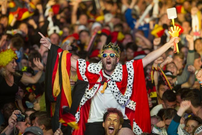 Fans in Berlin celebrate after Germany defeated Argentina in the World Cup final Sunday, July 13, in Rio de Janeiro. Germany won 1-0 with a goal from Mario Gotze in extra time. Click through to see reactions from fans around the world as they watched their favorite teams compete in the soccer tournament.