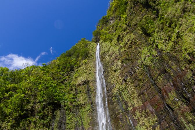 Off the famous Hana Highway, nestled into the Kipahulu District of Maui's Haleakala National Park, is the 400-foot Waimoku Falls.