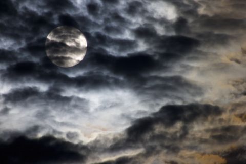 Minister Glenn Daman shot this photo from his deck in Stevenson, Washington, as the moon<a href="http://ireport.cnn.com/docs/DOC-1152267"> rose on the mountains</a> across the Columbia River Gorge. He was hoping to capture "the surreal and haunting image that the cloud covere provided." We'd say he succeeded!