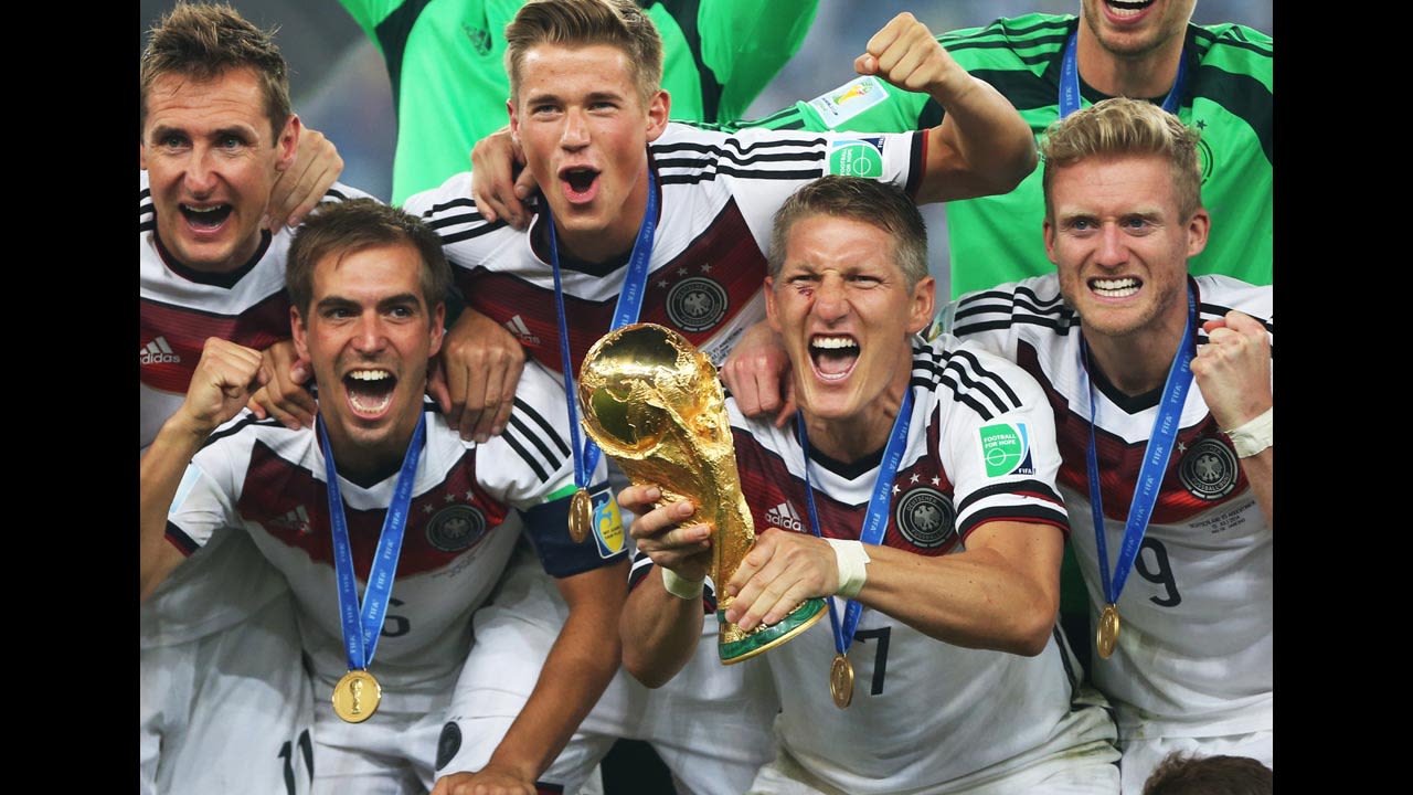 Bastian Schweinsteiger of Germany lifts the trophy during the 2014 World Cup final match between Germany and Argentina at The Maracana Stadium on July 13, 2014 in Rio de Janeiro, Brazil.