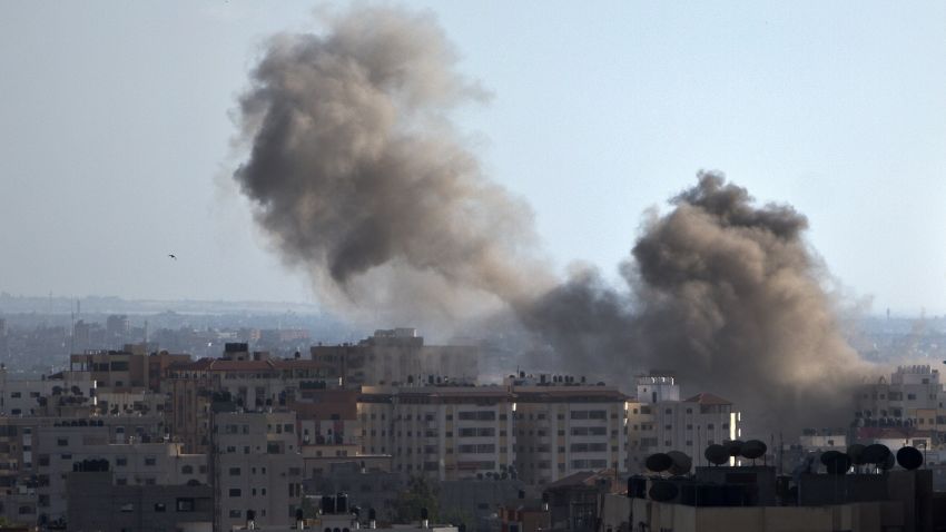 Smoke billows from a building hit by an Israeli air strike in Gaza City, on July 14, 2014. Washington warned its Israeli ally today against any ground invasion of Gaza, as Egyptian officials said the US top diplomat was headed to the region to join efforts to end a week of deadly violence. AFP PHOTO/MAHMUD HAMSMAHMUD HAMS/AFP/Getty Images
Credit: 	AFP/Getty Images