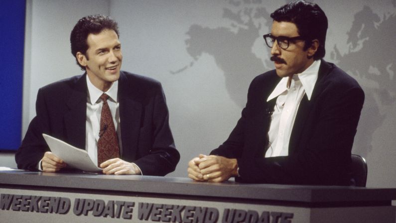 Norm Macdonald, left, goofs around with Kevin Nealon on "SNL." Macdonald hosted Weekend Update from 1994 to 1997 but was ousted after NBC exec Don Ohlmeyer <a href="http://www.ew.com/ew/article/0,,274941_1,00.html" target="_blank" target="_blank">complained that he wasn't funny. </a>