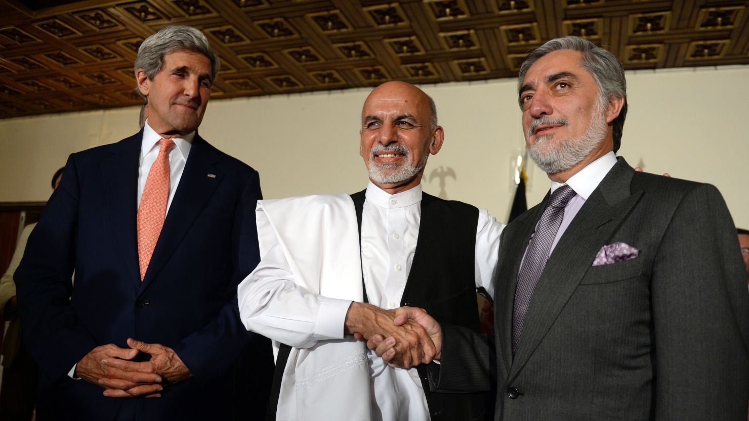 John Kerry appears with Afghan presidential candidates Ashraf Ghani, center, and Abdullah Abdullah last month in Kabul.