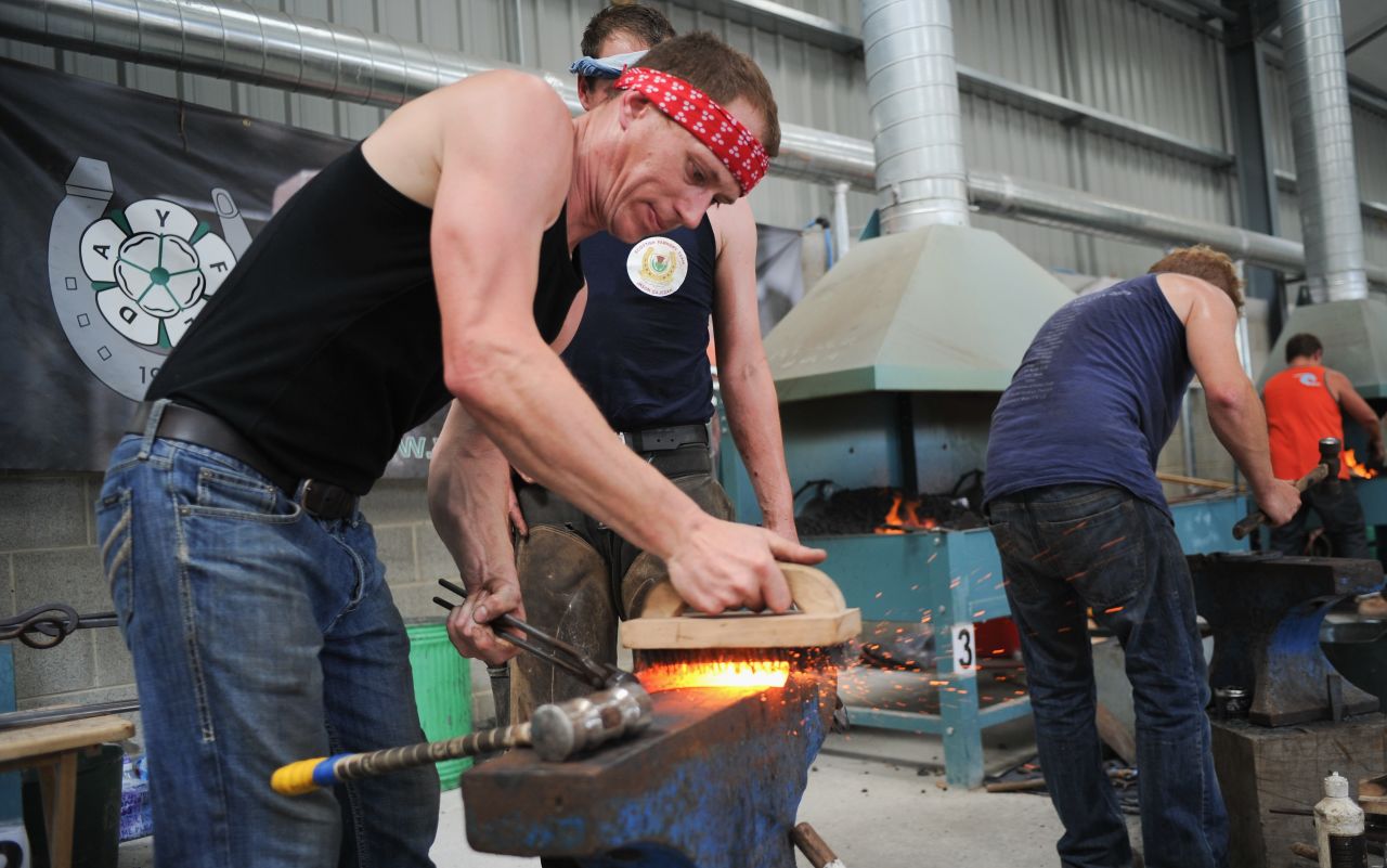Farriery can be a sport in its own right. Here, farriers at the Great Yorkshire Show compete against each other. Judges look for the quality of metal forging, fitting and finish on the shoe.