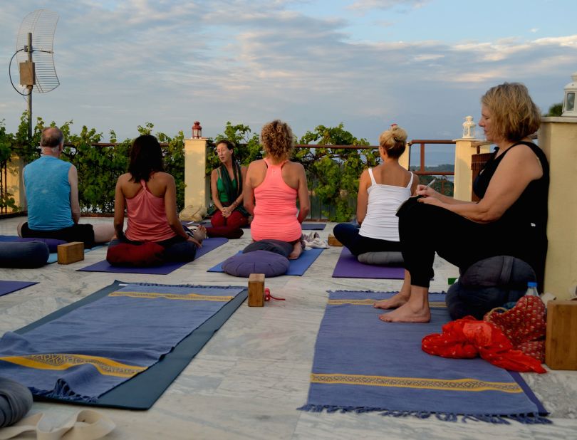 At dusk, spiritual talks and yoga sessions are held on the roof of the main Basunti house.