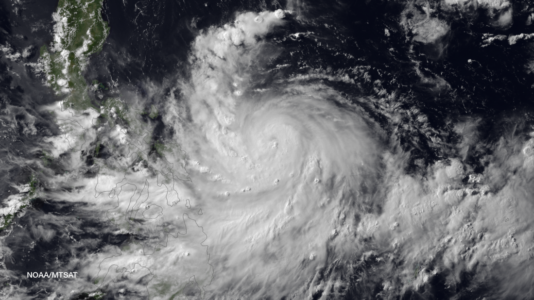 A satellite image shows Rapu-Rapu Island in the Philippines in the center of the eye of Typhoon Rammasun on Tuesday, July 15. 