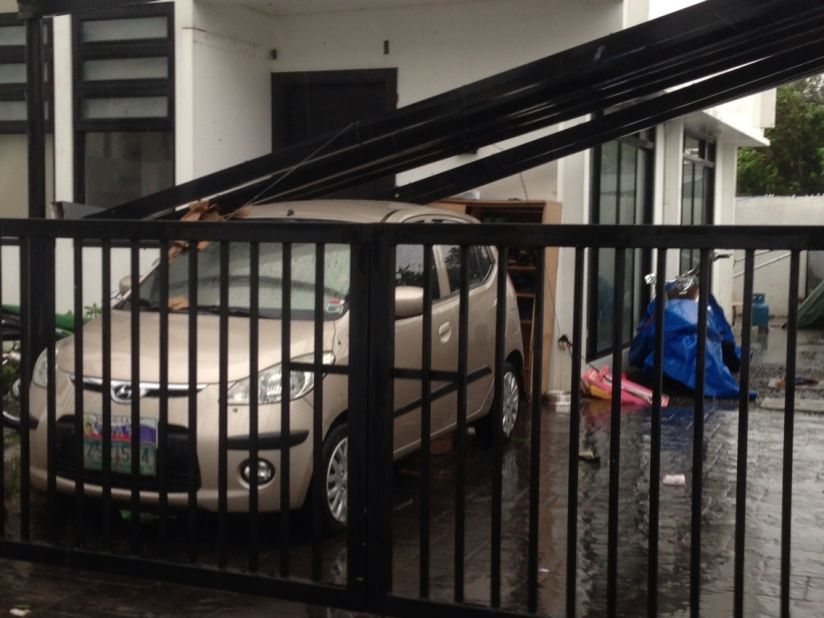 Rammasun causes damage to a resident's carport on July 16.