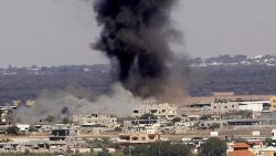 Smoke rises after an Israeli air strike in Rafah, in the southern Gaza Strip July 16, 2014.    