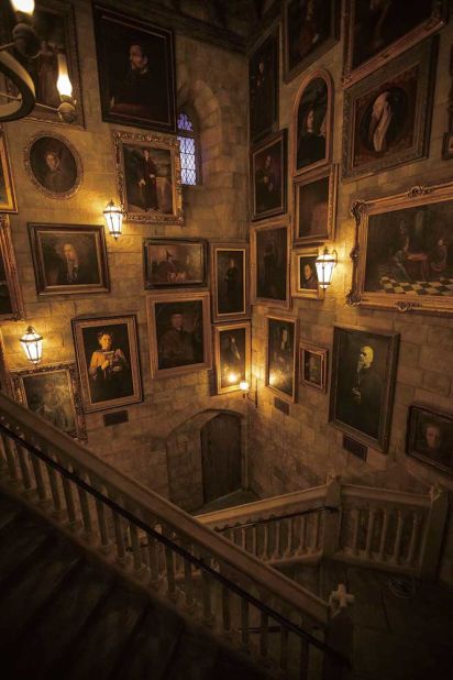 Just like in the films, portraits line the walls of Hogwarts Castle in the Wizarding World of Harry Potter. Visitors walk through the gallery to get to the "Harry Potter and the Forbidden Journey" ride. 