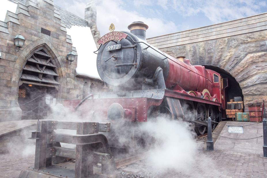The scarlet Hogwarts Express steam engine is on display at Hogsmeade Station. It's the first thing visitors see after passing through the arch into Hogsmeade. 