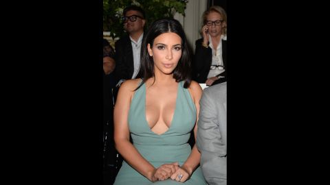 Fan Claire Leeson is trying to look like Kim Kardashian seen here attending Paris Fashion Week in July 2014 in Paris, France. 