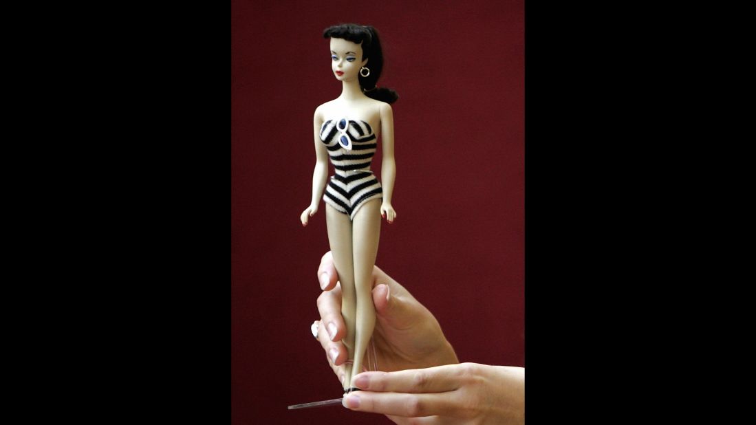 When the first Barbie was released in 1959, in her black and white swimsuit, she was considered to be a rebel, embodying both sensuality and innocence.