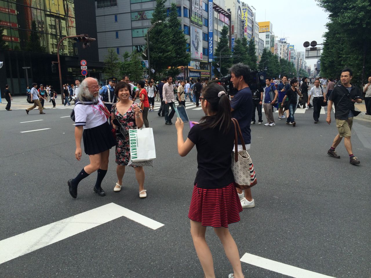 People are constantly asking Kobayashi to pose for pictures and he rarely says no.  Sometimes a 15-minute walk can take two hours, he says. Pictures shared on social media have made him famous.