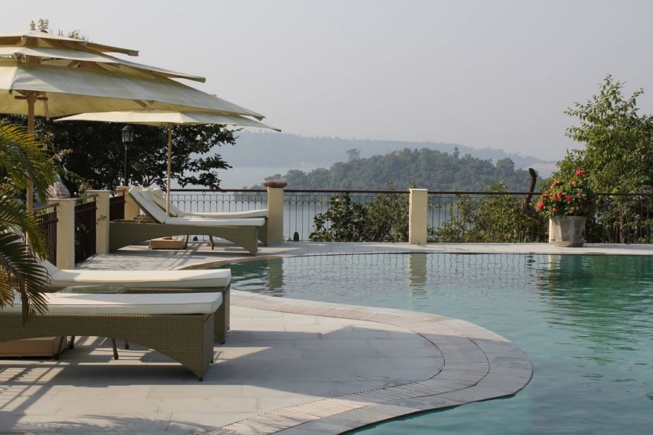 Basunti's swimming pool sits among papaya trees and bougainvillea flowers, and offers views over the lake.