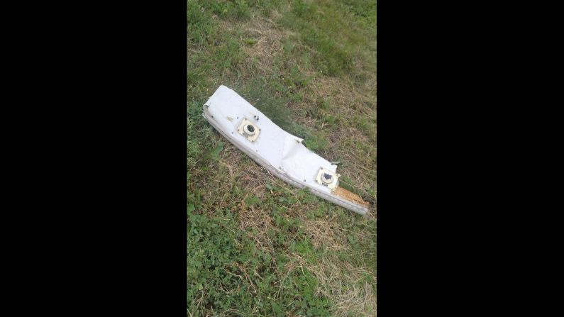A piece of wreckage believed to be from MH17. This image was posted to <a href="index.php?page=&url=https%3A%2F%2Ftwitter.com%2FMatevzNovak" target="_blank" target="_blank">Twitter</a>.