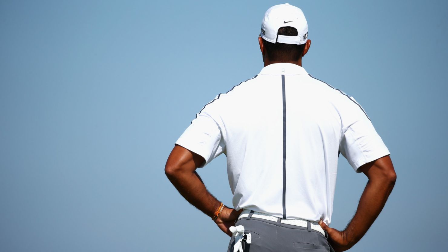 Tiger Woods is back in the game after crediting his physio with alleviating a dislocated bone in the base of his spine