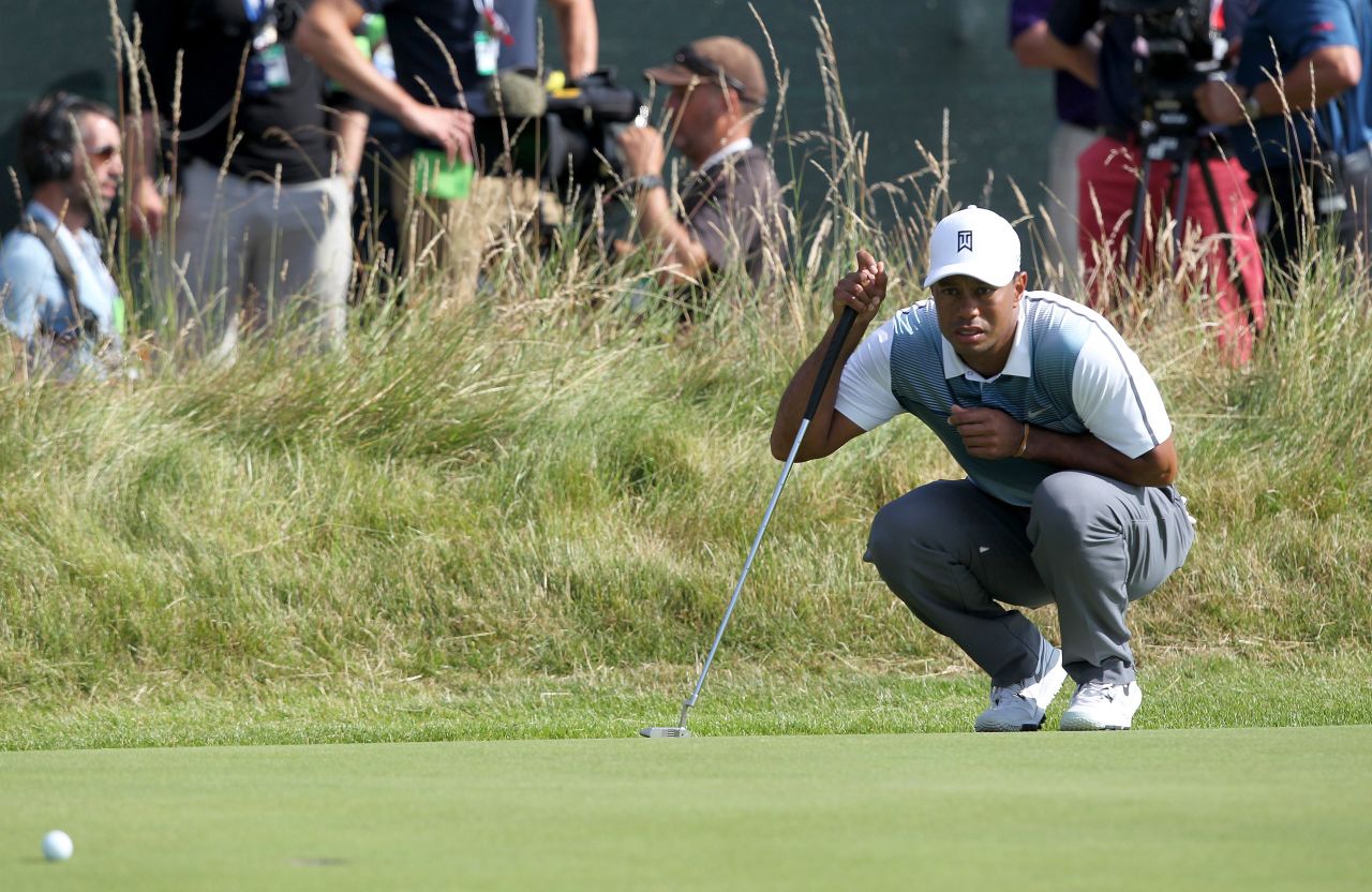 After his first round <a href="http://us.cnn.com/2014/07/17/sport/golf/tiger-woods-british-open-golf/index.html?hpt=hp_t2">Tiger Woods complained fans hadn't put their mobile phones on silent.</a>