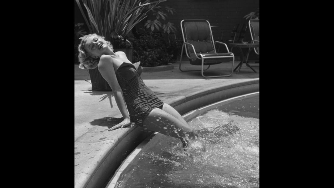Blond bombshell Marilyn Monroe makes a splash circa 1951.