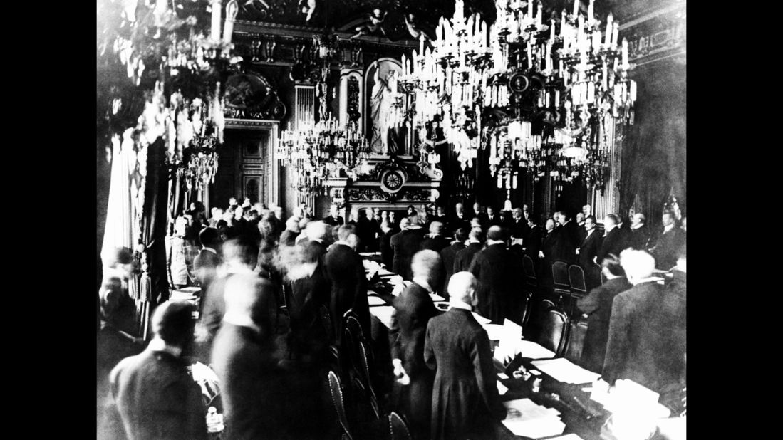 At Versailles Palace, representatives of Germany and the Allies sign the treaty that ended World War I, June 28, 1919. Article 231, the notorious War Guilt clause, required "Germany (to) accept the responsibility of Germany and her allies for causing all the loss and damage" during the war.