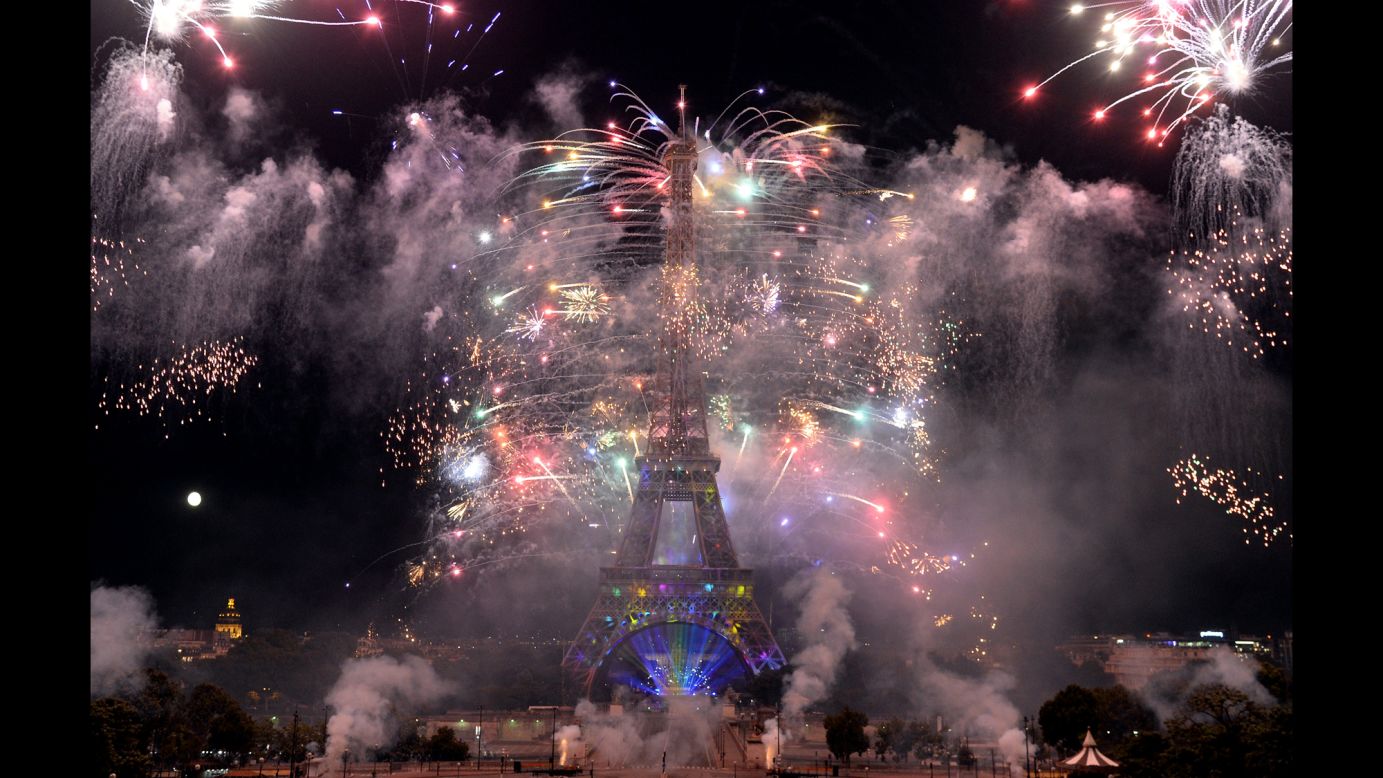 Fireworks burst around the Eiffel Tower during the annual Bastille Day celebrations in Paris on Monday, July 14. The festivities commemorate the beginning of the French Revolution with the storming of the Bastille in 1789.