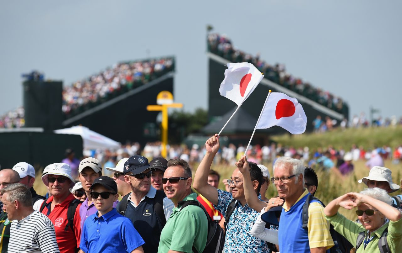 It's not just Scousers -- inhabitants of Liverpool -- attending the Open at Hoylake. This is a global event as these supporters of Japan's golfers out on the course prove.