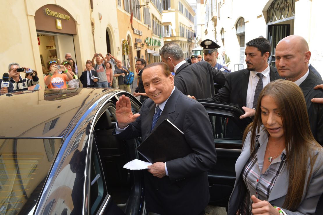Silvio Berlusconi is seen leaving a press conference in Rome in 2014.