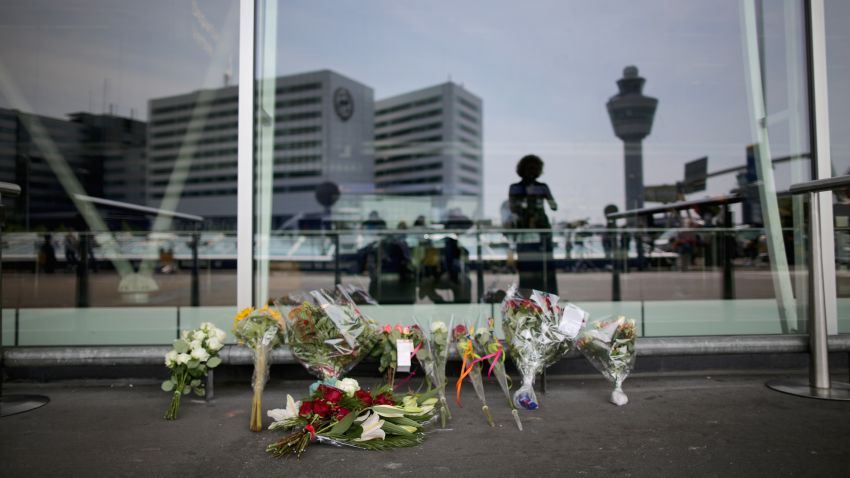 Floral tributes adorn the entrance to Schiphol Airport in memory of the victims of Malaysia Airlines flight MH17 on July 18, 2014 in Amsterdam, Netherlands.