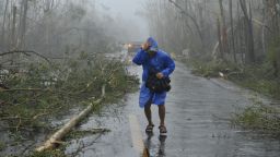 A man walks past fallen trees on a street after super typhoon Rammasun hit the area in Wenchang, south China's Hainan province on July 18, 2014. China braced for a powerful super typhoon heading for its southern coast after the storm left a trail of destruction and at least 40 dead in the neighbouring Philippines.China's National Meteorological Center (NMC) said Super Typhoon Rammasun was on course to hit Hainan island and Guangdong province late in the afternoon. CHINA OUT AFP PHOTOSTR/AFP/Getty Images