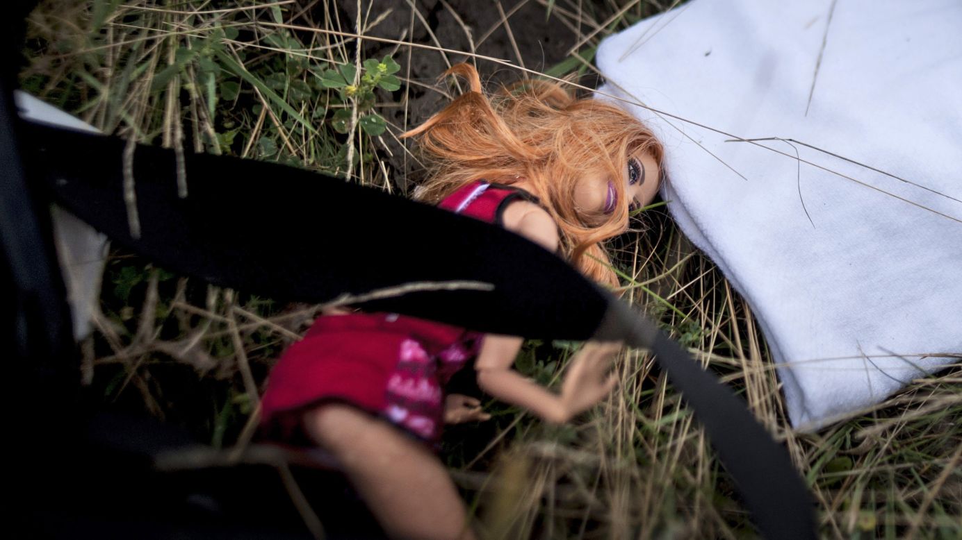 A doll is seen on the ground on Saturday, July 19.