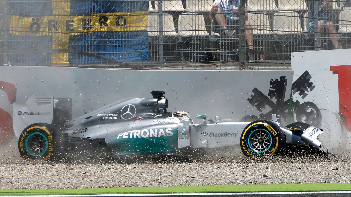 Lewis Hamilton's car skids over the gravel trap as he crashes during qualifying for the German Grand Prix on Saturday.