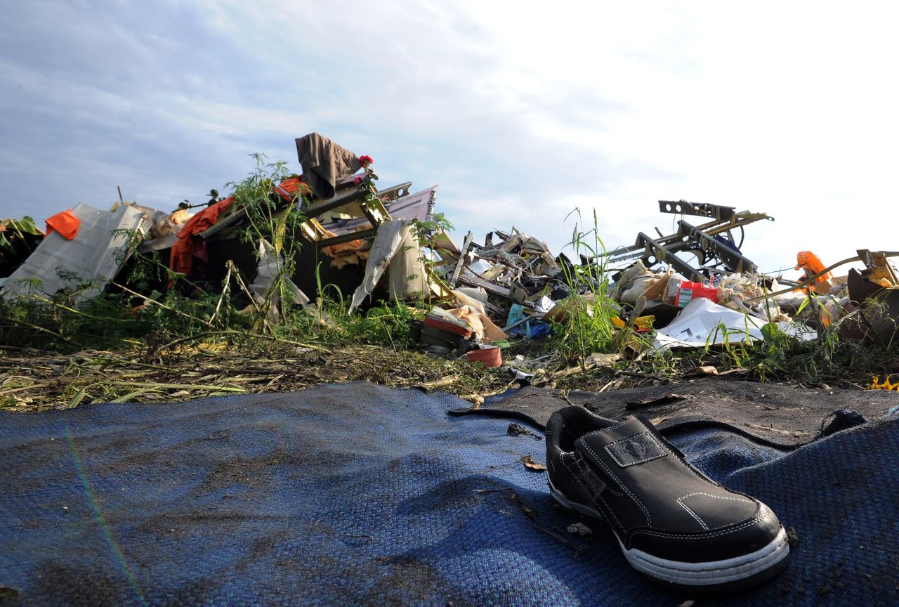 A single shoe is seen among the debris and wreckage on July 19. There has been concern that the site has not been sealed off properly and that vital evidence is being tampered with. 