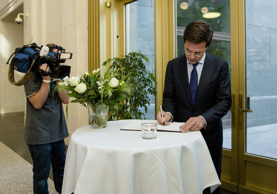 Dutch Prime Minister Mark Rutte signs a condolence register at the Ministry of Safety and Justice in The Hague, Netherlands, on Friday, July 18. "I want to see results in the form of unimpeded access and rapid recovery," Rutte said in a press briefing. "This is now priority number one."