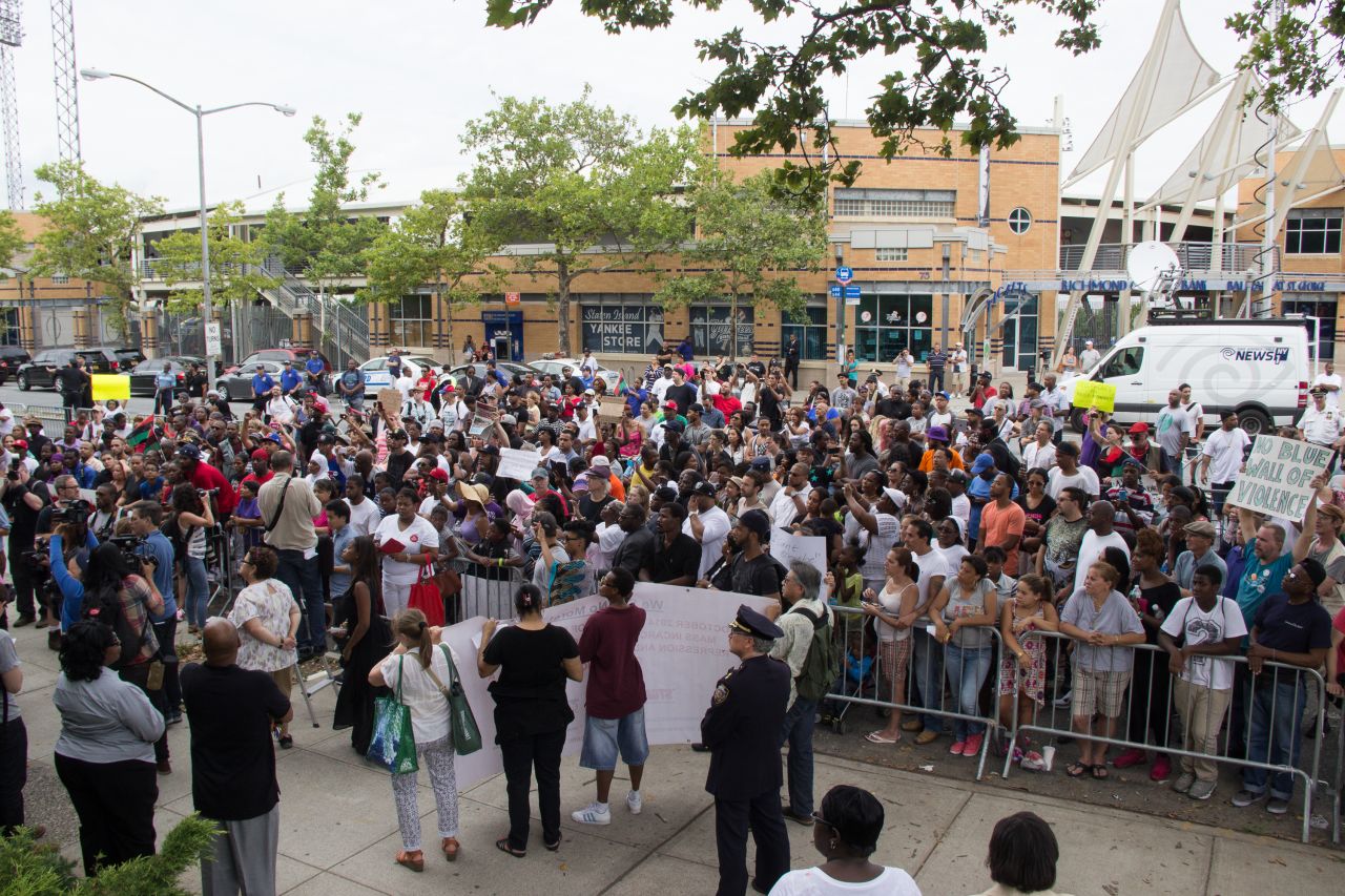 Garner's family, friends and people from the Staten Island community gathered in July 2014 to demand a full investigation into the incident.