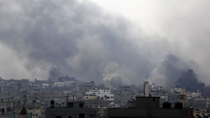 Smoke billows following reported heavy Israeli shelling in Gaza's eastern Shejaiya district on July 20. 